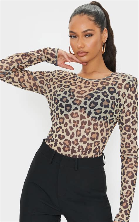 Get ready to make a statement in our Money Print Bodysuit!